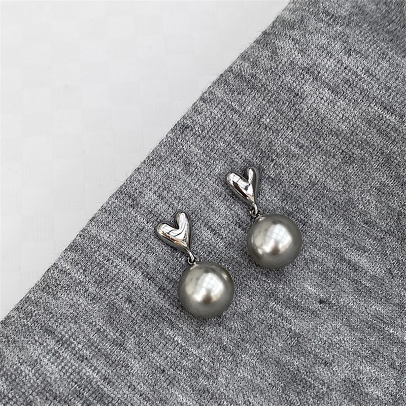 Boucles d'oreilles pendantes e - Vintage Fashion Jewelry Brands avis et prix