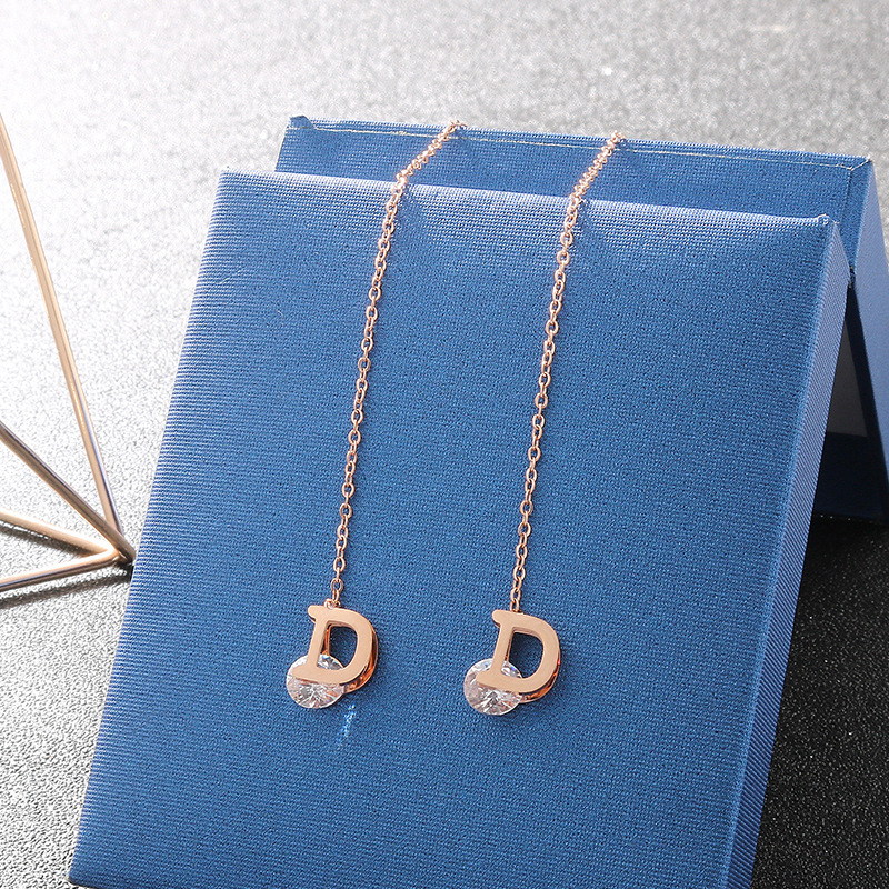 Boucles d'oreilles lettre D en - Vintage Fashion Jewelry Brands avis et prix