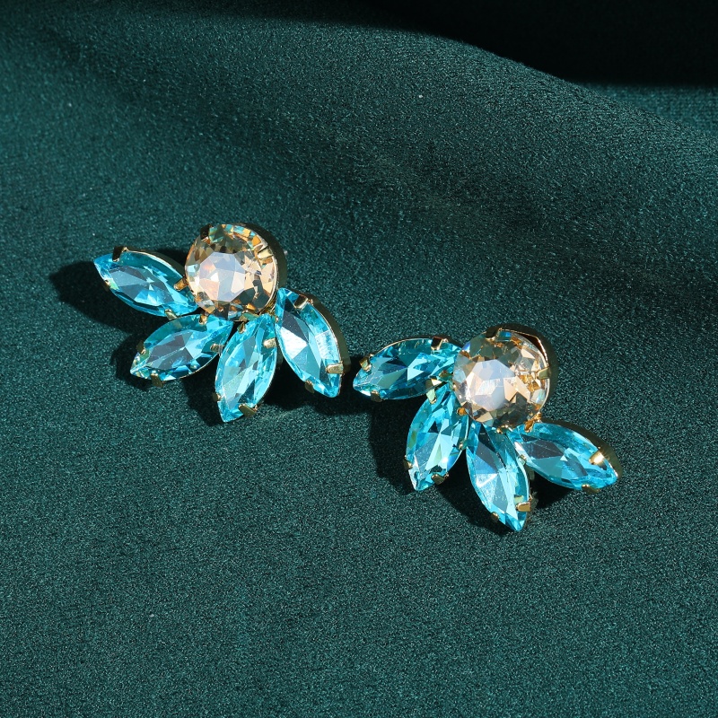 Boucles d'oreilles demi-fleur  - Vintage Fashion Jewelry Brands avis et prix