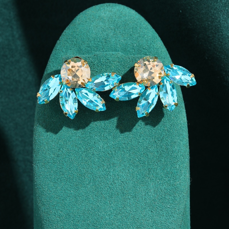 Boucles d'oreilles demi-fleur  - Vintage Fashion Jewelry Brands avis et prix