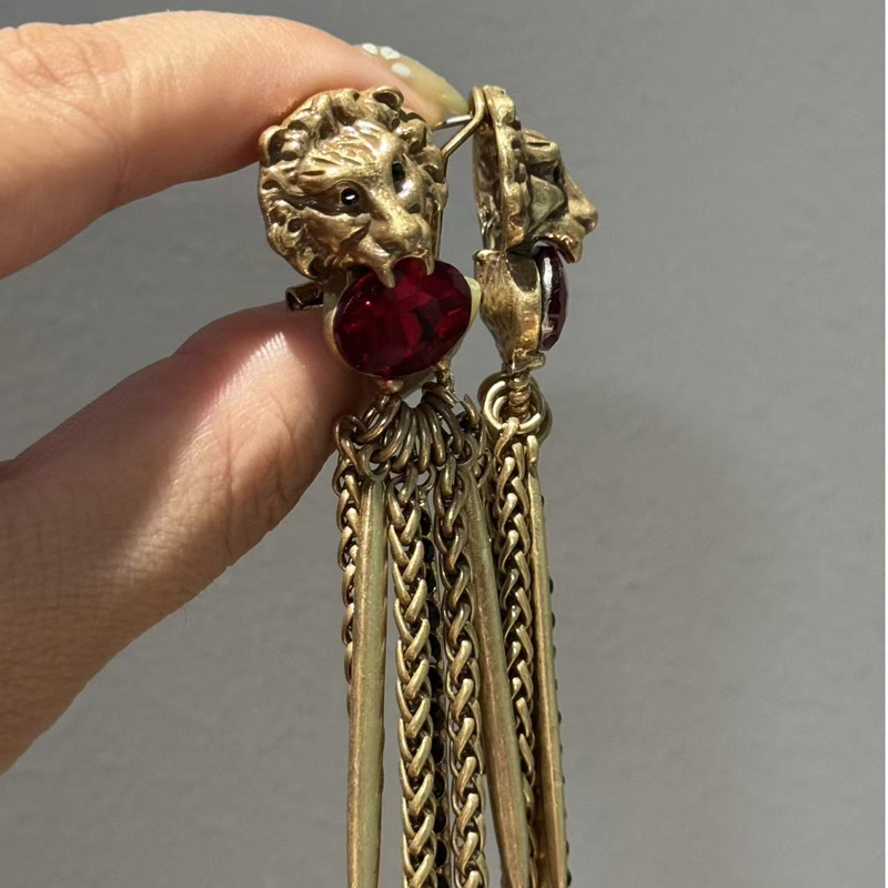 Boucles d'oreilles longues vin - Vintage Fashion Jewelry Brands avis et prix